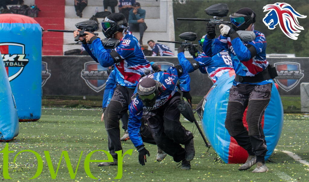 The GB Paintball Team in action with Tower Leasing Logo